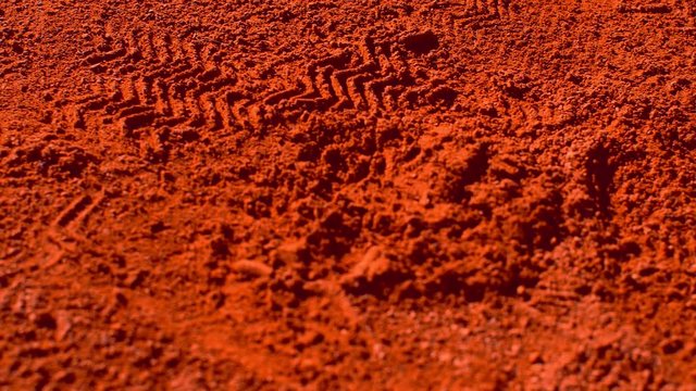 Background of red clay tennis court with shoes traces , dolly, 4k, slow motion 75fps