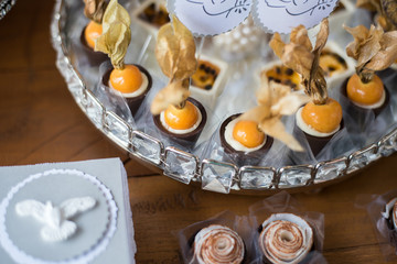 Sweets and decoration on the table - Baptism theme