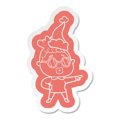 cartoon  sticker of a pointing woman wearing spectacles wearing santa hat