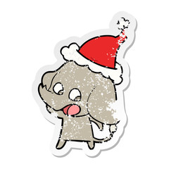 cute distressed sticker cartoon of a elephant wearing santa hat
