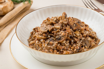 Fried buckwheat porridge with onions and mushrooms