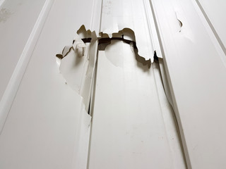 Old plastic lining with a broken hole