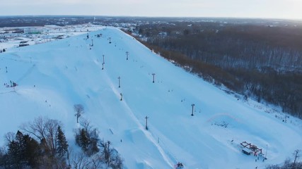 Snow park in Wisconsin, winter activities (tubing, skiing, snowboarding). Drone shots , bird's eyes view