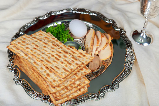 Close up of concept jewish holiday passover matzot and tallit the substitute for bread on the Jewish Passover holiday.