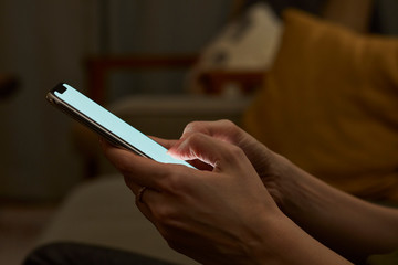 Holding hand on mobile phone