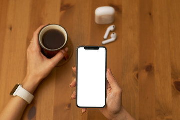 Holding hand on mobile phone