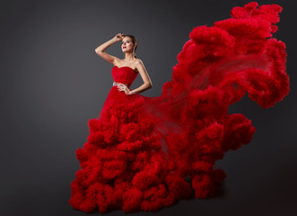 Woman in Red Ruching Dress, Fashion Model in Cloud Gown with Long Waving Flying Tail