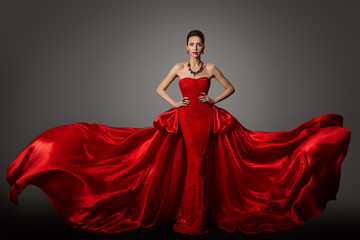 Fashion Model Red Dress, Woman in Long Fluttering Waving Gown, Young Girl Beauty Portrait - obrazy, fototapety, plakaty