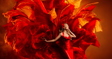 Woman Art Fantasy, Dancing Fashion Model on Abstract Red Fabric Color Explosion Background