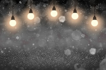 beautiful shiny glitter lights defocused bokeh abstract background with light bulbs and falling snow flakes fly, celebratory mockup texture with blank space for your content
