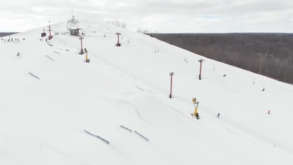 Snow park in Wisconsin, winter activities (tubing, skiing, snowboarding). Drone shots , bird's eyes view