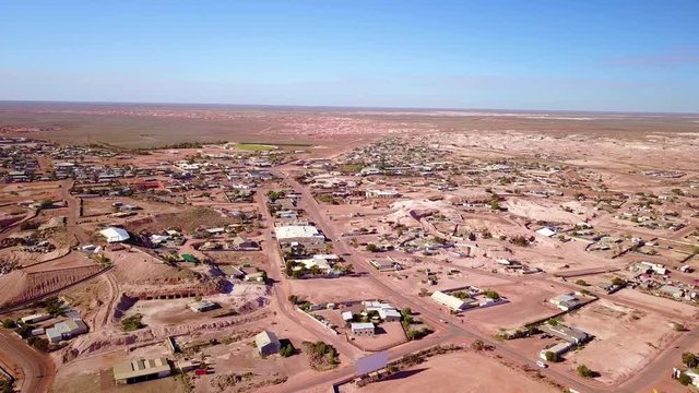Aerial drone shot reveals the outback bush opal mining town of Coober Pedy, Australia.