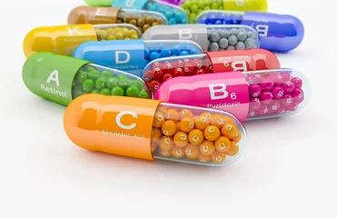 Fotobehang 3d rendering of many vitamin capsule © marog-pixcells