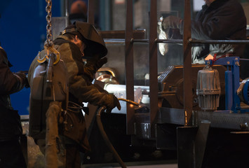 Industrial concept. A man welder working at the factory.