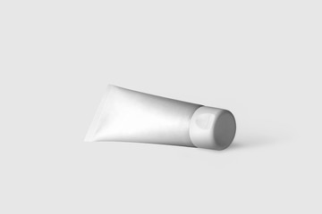 Cosmetic Tube Mock Up. Cosmetic, Cream, Tooth Paste, Glue White Plastic Tube Packaging  isolated on a soft gray background.3D Illustration
