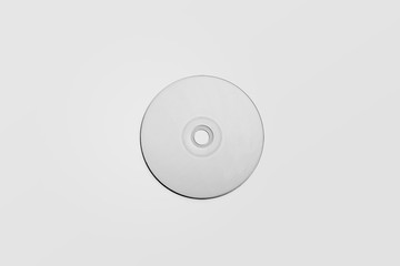 Blank white surface printable compact-disc isolated on a soft gray background.