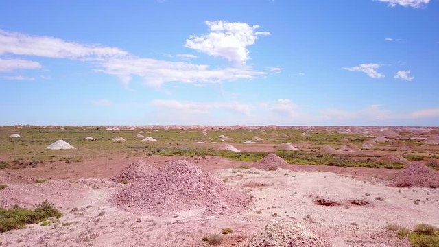 Aerial drone shot of opal mines and mining tailings in the desert outback of Coober Pedy Australia.