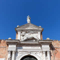 Venetian Arsenal, old shipyard, relief of Lion of Saint Mark on facade, Venice, Italy