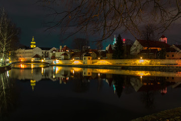 Nigh city Ceske Budejovice with reflection in Malse river