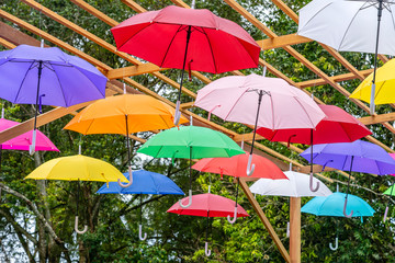 Fototapeta na wymiar Street decorated with colored umbrellas, island Koh Phangan, Thailand