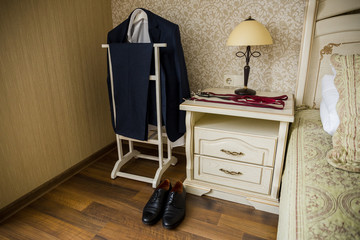 suspenders and men's suit in the room