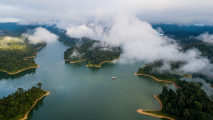 A beautiful landscape of aerial view at Royal Belum Malaysia with the fog surrounding the hill area