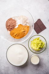 Ingredients for making vegan chocolate cake, top view.