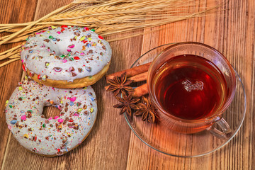 Glazed donuts with tea