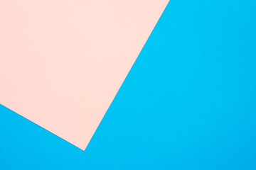 Fototapeta premium Two tone pink blue color paper background with copy space