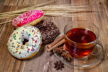 Glazed donuts with tea