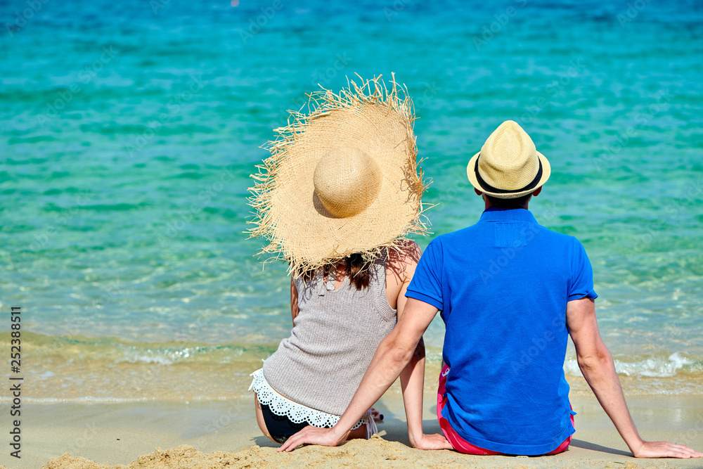 Wall mural couple on beach in greece