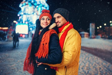 Winter evening of love couple outdoors