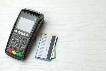 POS terminal, Payment Machine with credit card isolated on white background. Contactless payment with NFC technology.