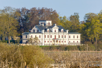 Fototapeta na wymiar Old Castle on the lakeshore in spring