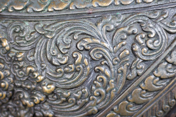 Texture Lion cast by bronze in Wat Phra Kaew or name officially as Wat Phra Si Rattana Satsadaram