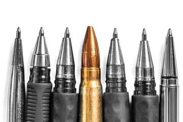 Bullet and pens on white background. Freedom of the press is at risk concept. World press freedom...