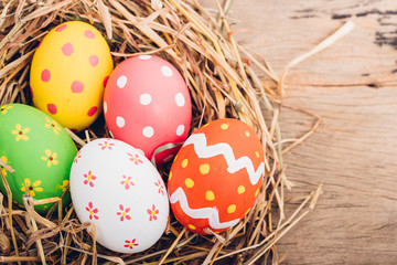 Beautiful Easter multi color egg in straw