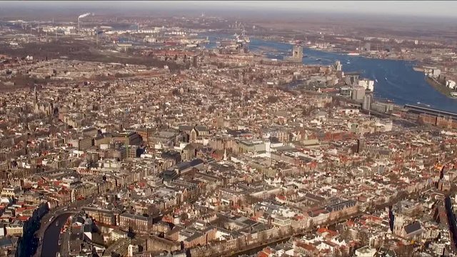 Slow Motion Aerial of the inner city of Amsterdam, with its canals and old mansions.