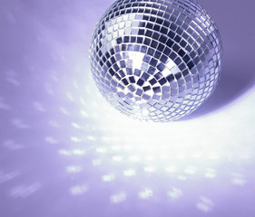 beautiful disco ball on yellow background isolated.