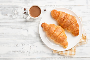 Delicious breakfast with fresh croissants.