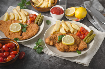 Homemade german schnitzel with pickles