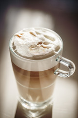 Glass with latte macchiato.