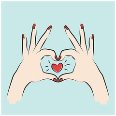 Heart from the woman's hand, red nail polish on a green background, Hands making heart sign