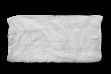 fold white handkerchief on black background
