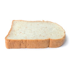 Fresh whole wheat bread slice isolated on a white background.