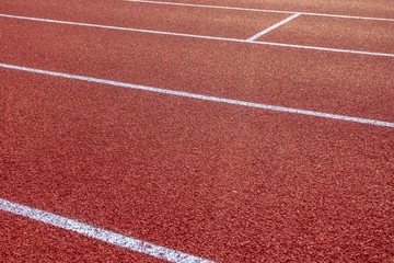 Fototapeta premium Red running track in stadium