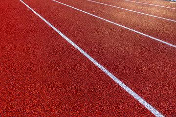 Red running track in stadium