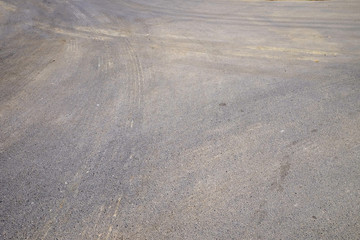 Wheel track on asphalt road texture
