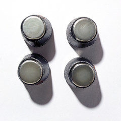 metal cups on white background