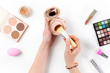 Beauty blogger with makeup cosmetics.